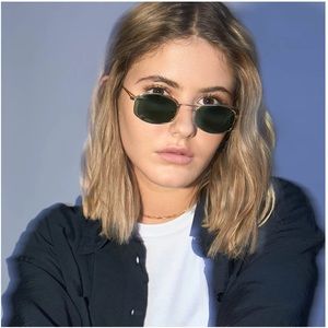 Meller never worn sunglasses. Gold frame gray lenses